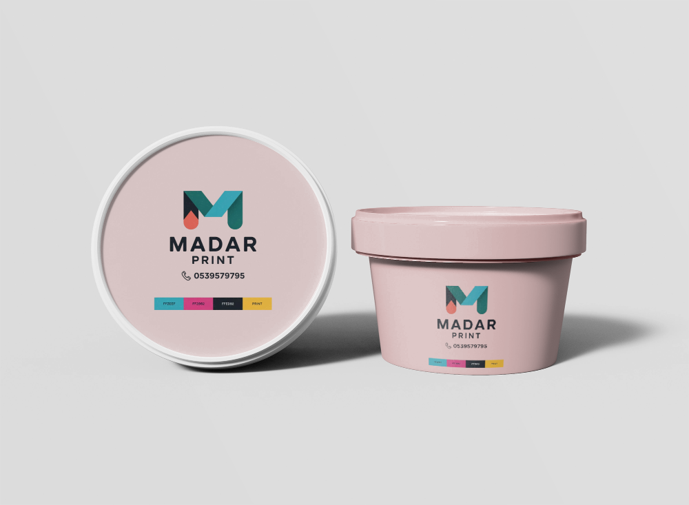 Madar Print pink container with logo and contact info for high-quality printing services.