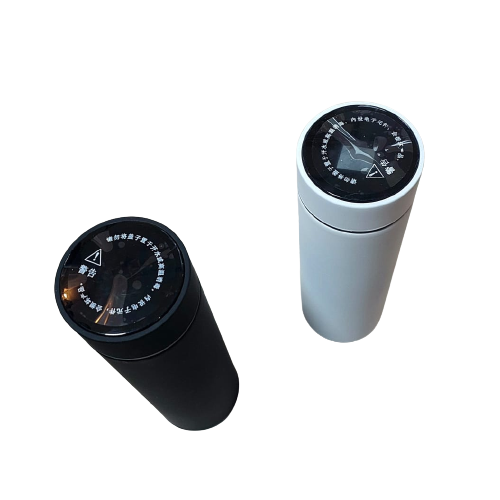 Black and white insulated travel thermos bottles with measurement dial on top, perfect for hot and cold beverages.