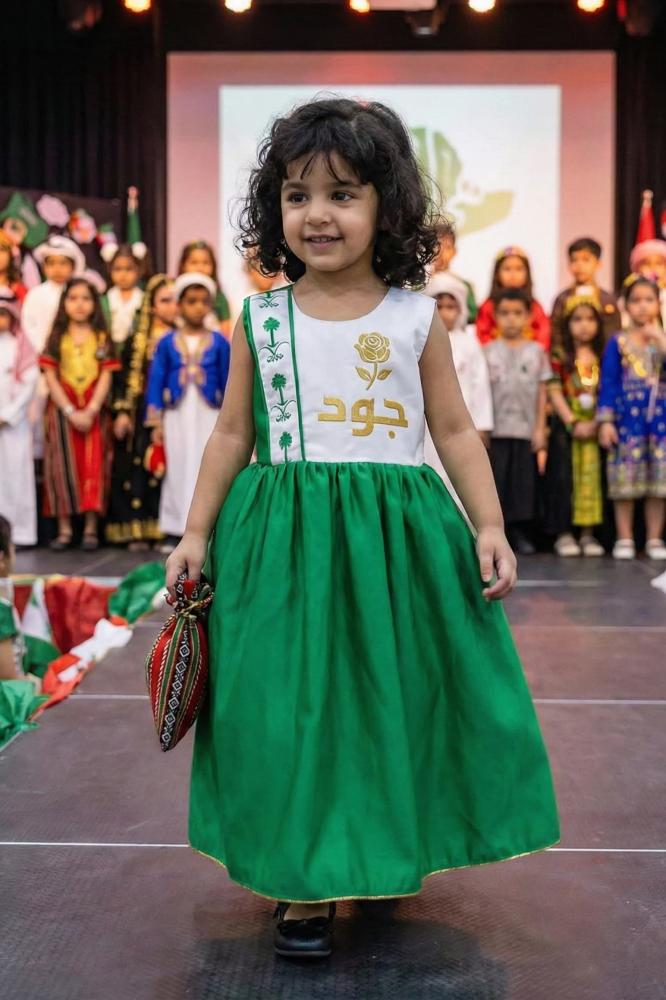 Green and white National Day dress with embroidery of two swords and a royal palm tree for girls — product image 3
