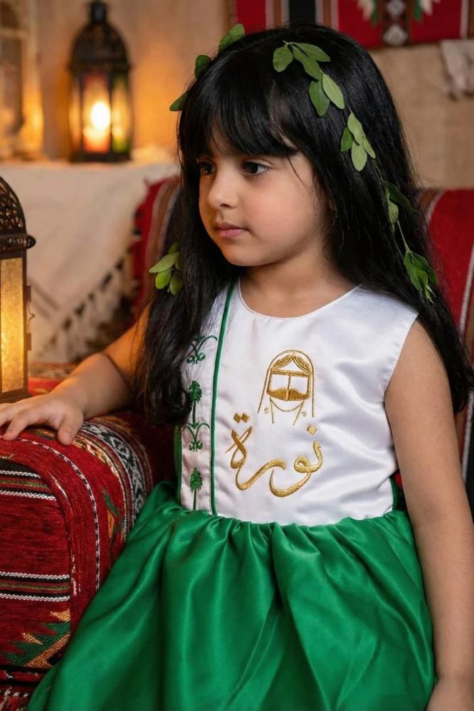 Green and white National Day dress with embroidery of two swords and a royal palm tree for girls — product image 2
