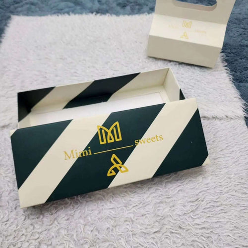 Box with 27.5 x 10.5 x 3 cm base and separate lid and holder