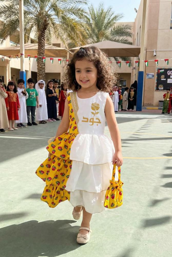 Girls' white and yellow shalky dress with a cheerful and elegant Ramadan design — product image 1