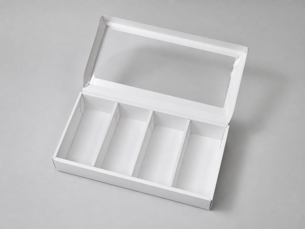 Open empty four-compartment bakery pie box with transparent lid from a different angle