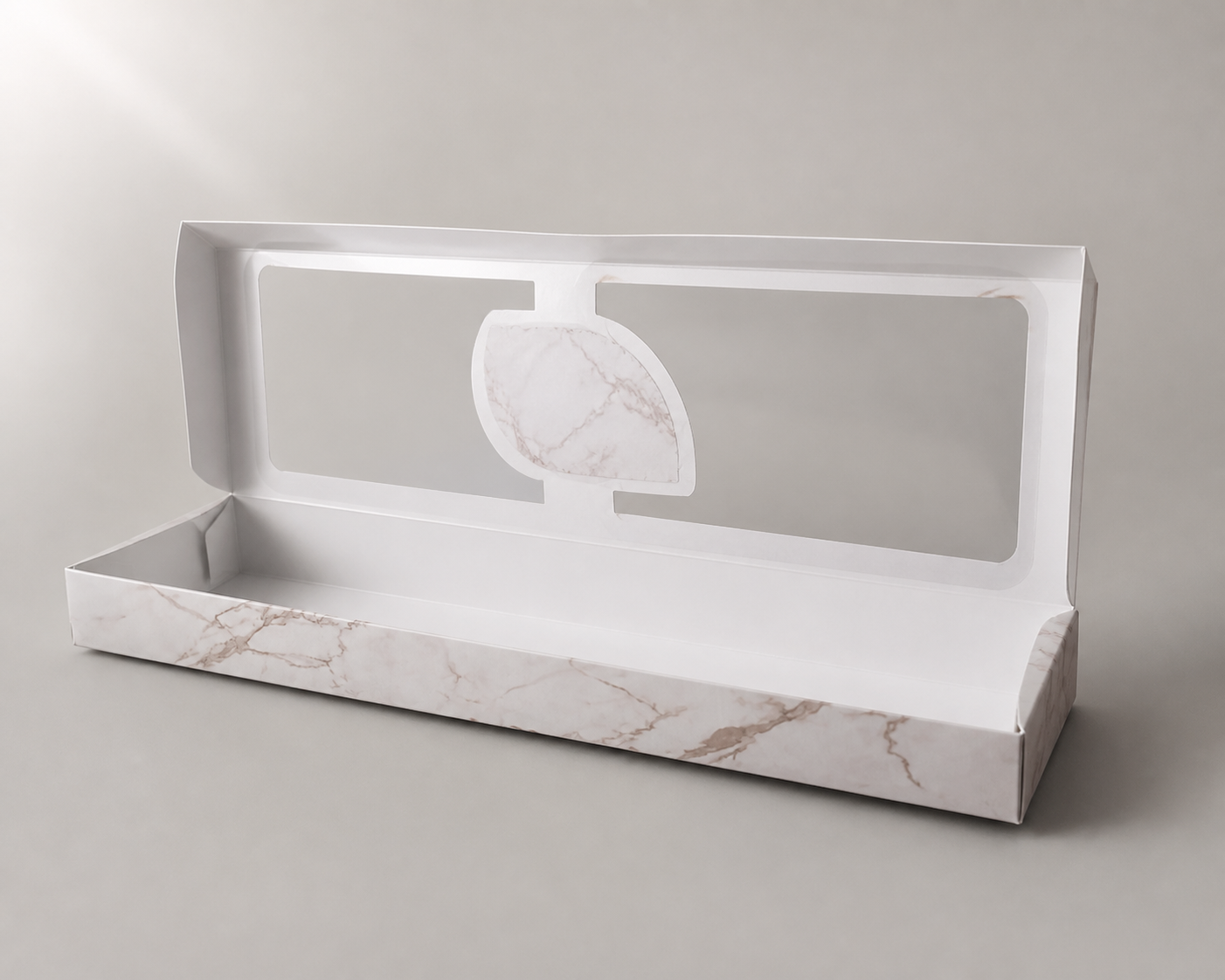 Open empty 40 x 16 cm marble printed clear-window sweets box from a different angle