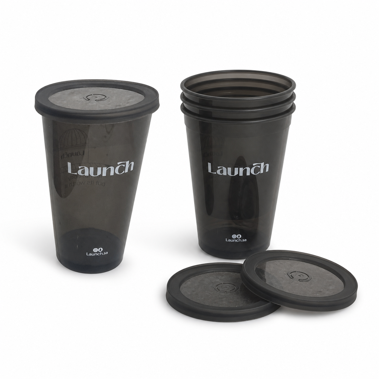 Custom black plastic cups displayed with stacked cups and lids