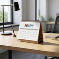 Realistic view of custom desk calendars on a sleek office desk with natural daylight highlighting the product's clean edges in a professional setting.