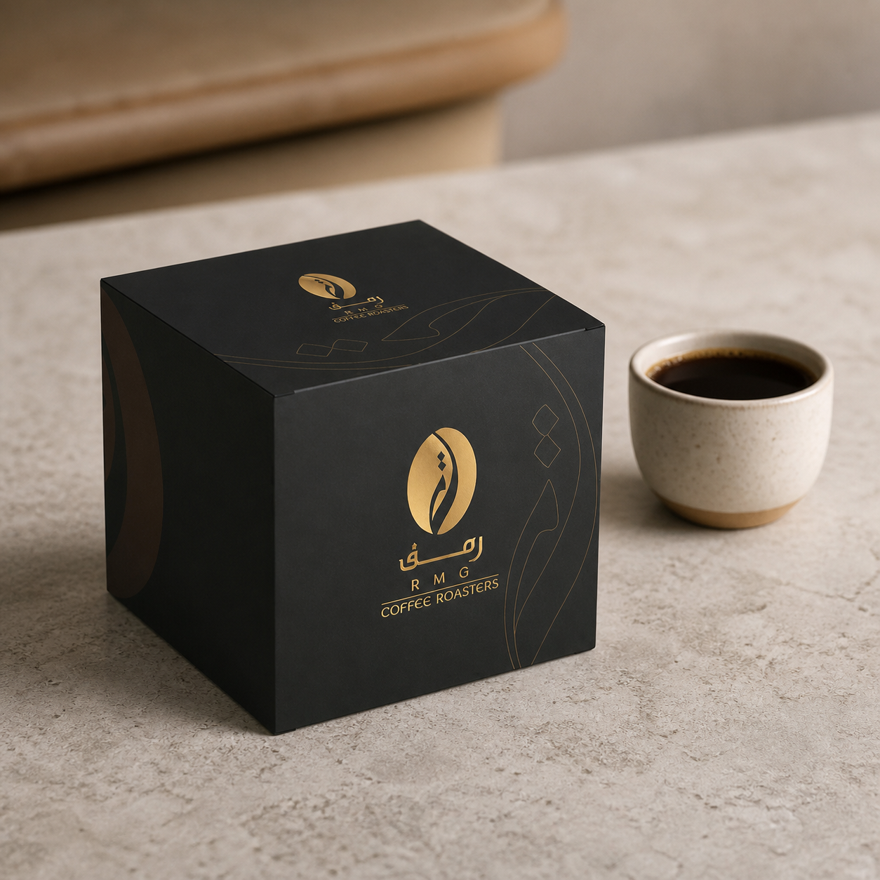 Custom printed coffee envelope box closed on a cafe counter