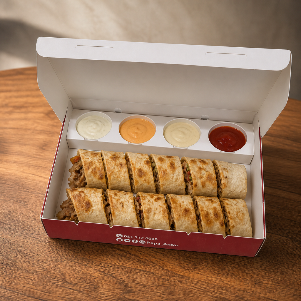 Custom printed shawarma box open and filled with sliced shawarma and four sauces