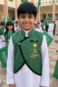 A plain green boys' blazer with a Saudi standing collar and a curved cut, with a brooch of two swords and a palm tree — product image 1