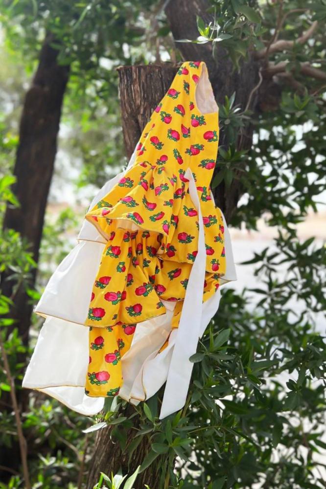 Girls' white and yellow shalky dress with a cheerful and elegant Ramadan design — product image 5