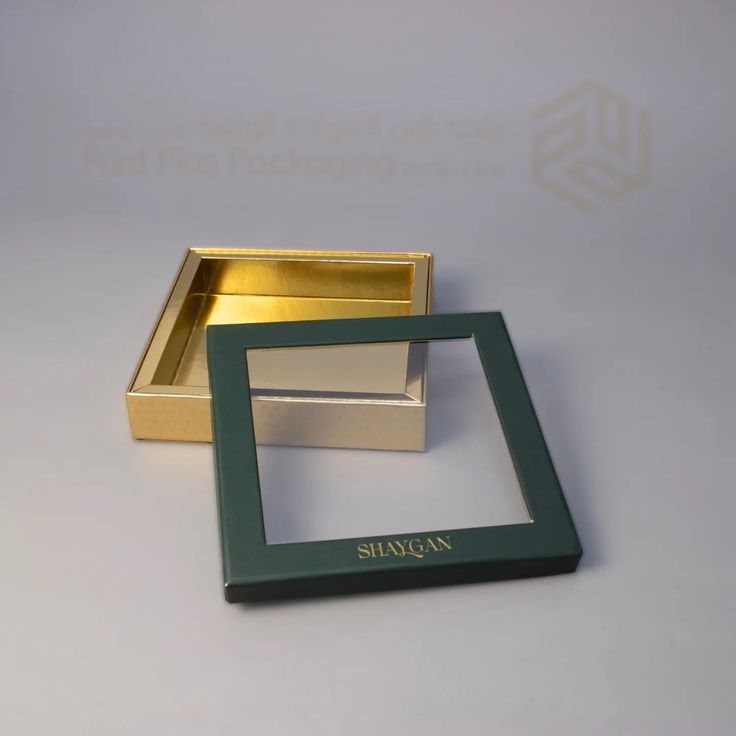 Transparent box with a golden foil base. Length 20 cm, Height 20 cm, Height 5 cm