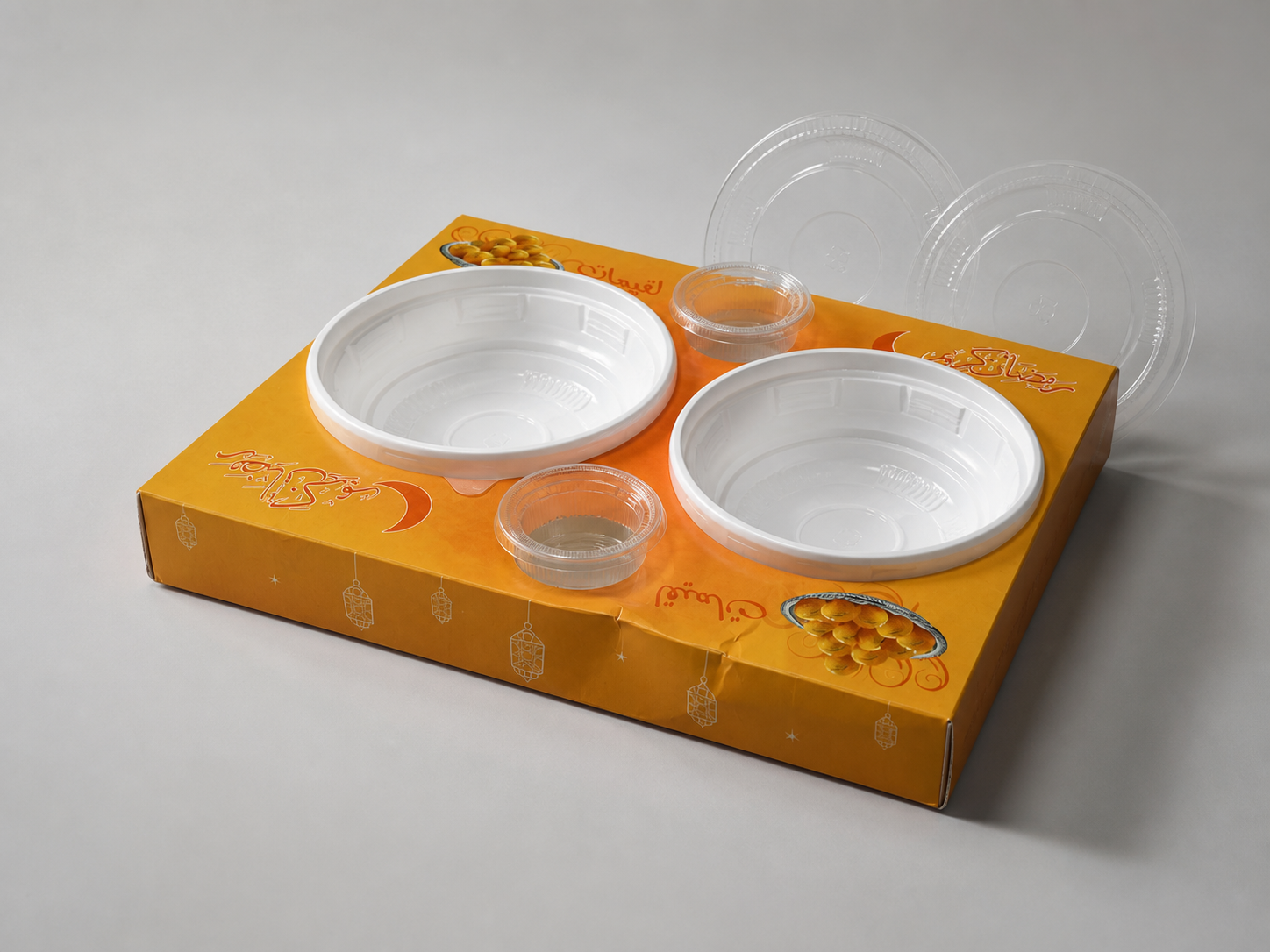 Empty salad and soup container carrier with two sauce cups, shown from a different angle