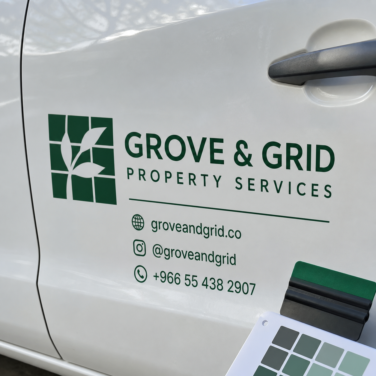 Grove & Grid custom vinyl vehicle door lettering close detail
